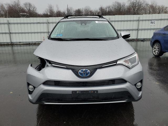 Photo 4 VIN: JTMRJREV6JD188627 - TOYOTA RAV4 HV LE 