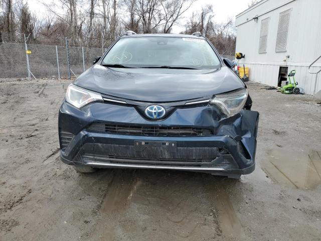 Photo 4 VIN: JTMRJREV6JD251175 - TOYOTA RAV4 HV LE 