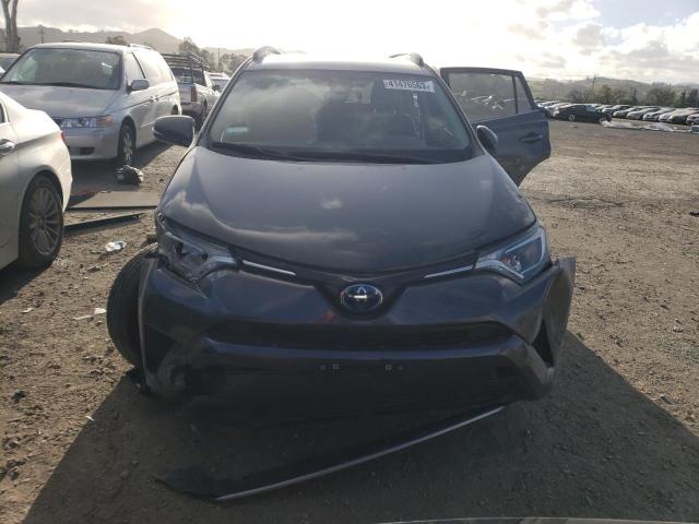 Photo 4 VIN: JTMRJREV6JD252097 - TOYOTA RAV4 HV LE 