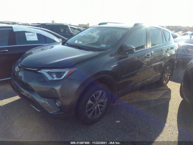 Photo 1 VIN: JTMRJREV7GD032458 - TOYOTA RAV4 HYBRID 