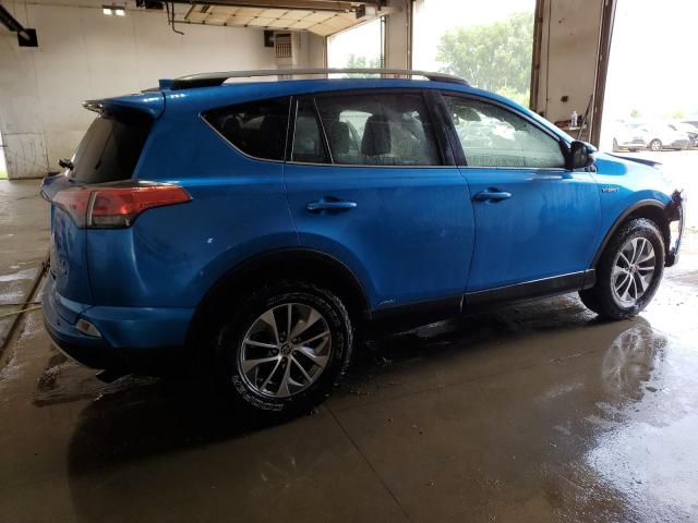 Photo 2 VIN: JTMRJREV7HD074064 - TOYOTA RAV4 HV LE 