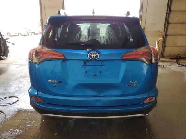 Photo 5 VIN: JTMRJREV7HD074064 - TOYOTA RAV4 HV LE 