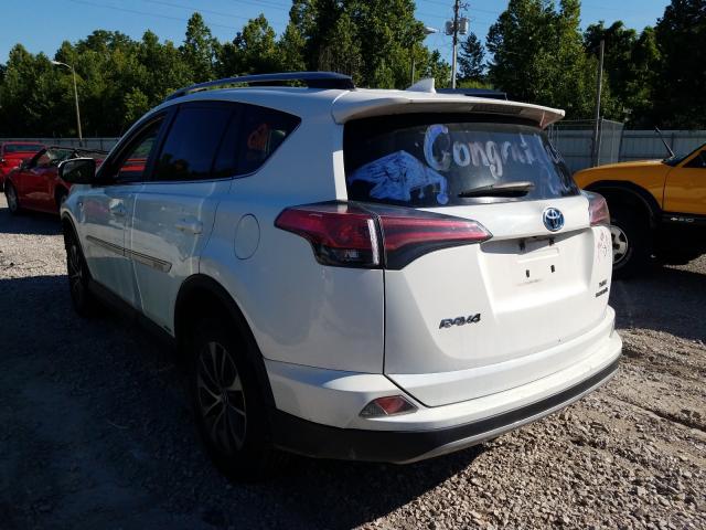 Photo 2 VIN: JTMRJREV7HD143299 - TOYOTA RAV4 HV LE 