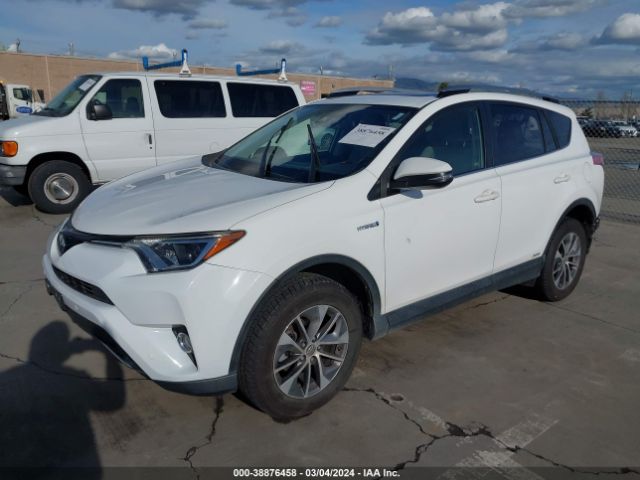 Photo 1 VIN: JTMRJREV7JD158178 - TOYOTA RAV4 HYBRID 