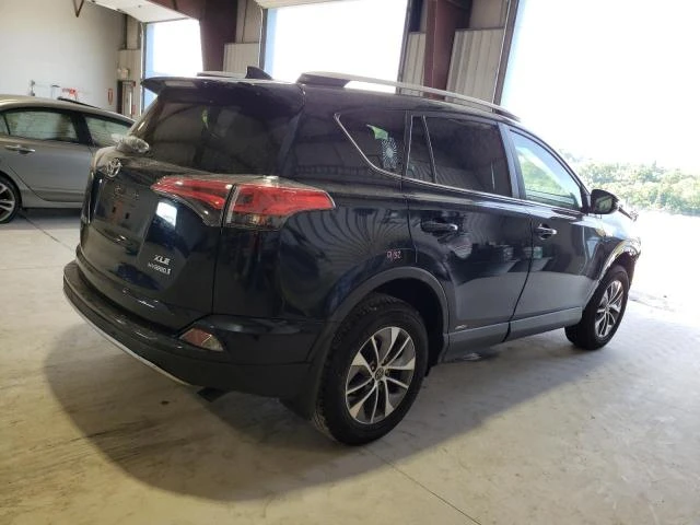 Photo 2 VIN: JTMRJREV7JD176955 - TOYOTA RAV4 HV LE 