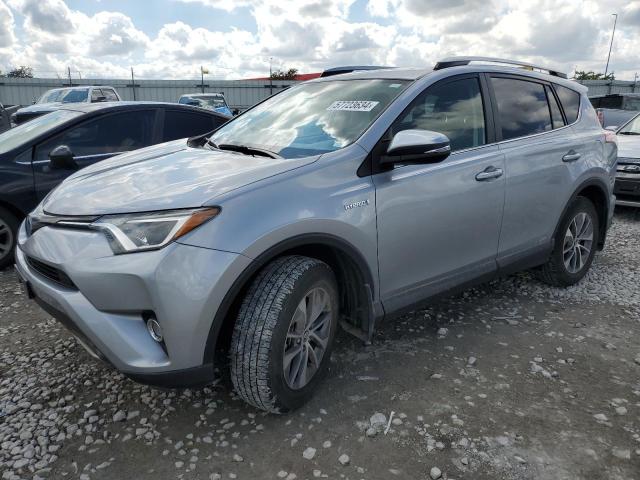 Photo 0 VIN: JTMRJREV7JD186174 - TOYOTA RAV4 HV LE 