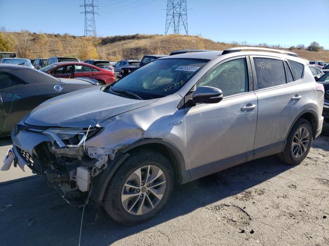 Photo 1 VIN: JTMRJREV7JD186563 - TOYOTA RAV4 HV LE 