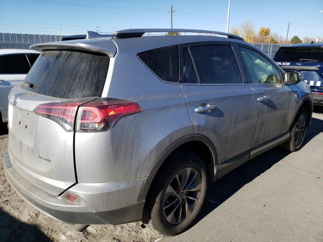 Photo 3 VIN: JTMRJREV7JD186563 - TOYOTA RAV4 HV LE 