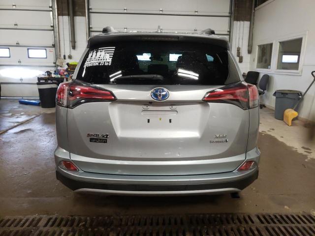 Photo 5 VIN: JTMRJREV7JD194226 - TOYOTA RAV4 HV LE 