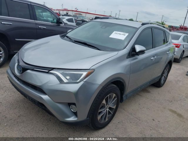 Photo 1 VIN: JTMRJREV7JD226981 - TOYOTA RAV4 HV 