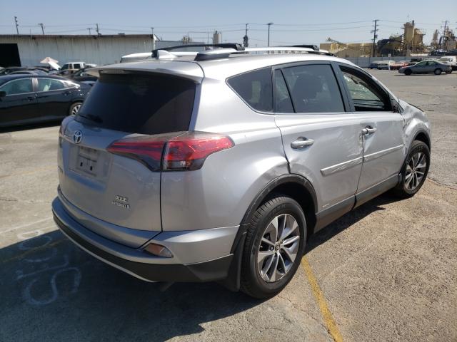 Photo 3 VIN: JTMRJREV7JD244607 - TOYOTA RAV4 HV LE 