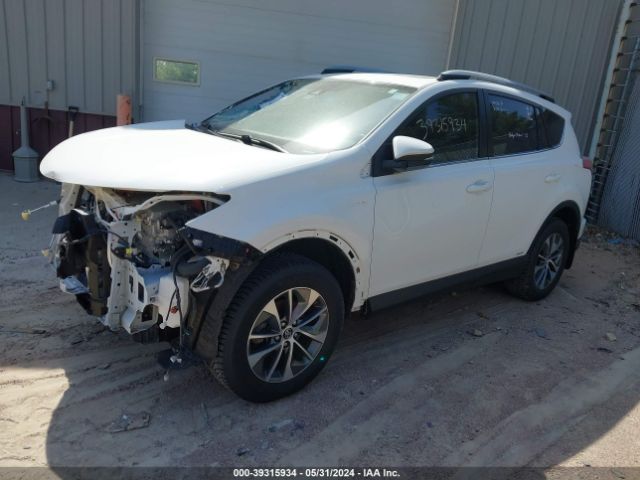 Photo 1 VIN: JTMRJREV7JD248477 - TOYOTA RAV4 HYBRID 