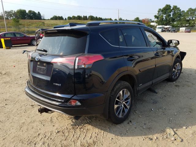 Photo 3 VIN: JTMRJREV7JD254649 - TOYOTA RAV4 HV LE 