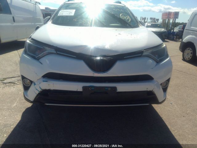 Photo 5 VIN: JTMRJREV8GD021081 - TOYOTA RAV4 HYBRID 