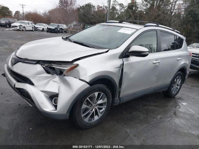 Photo 1 VIN: JTMRJREV8GD029083 - TOYOTA RAV4 HYBRID 