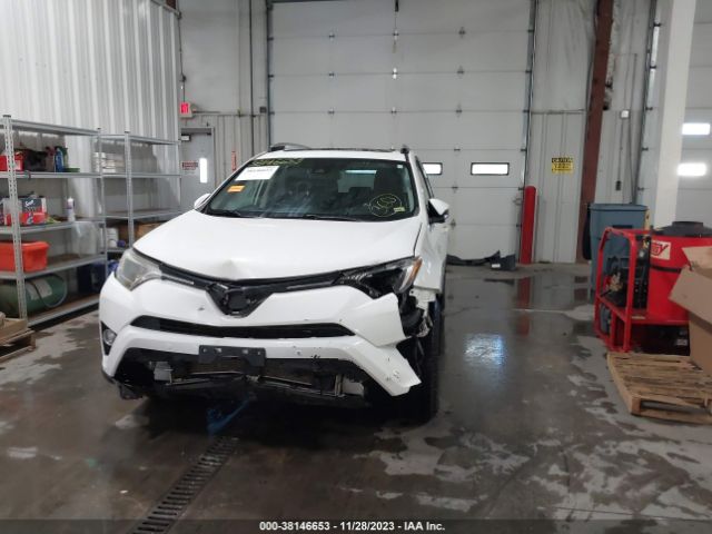 Photo 5 VIN: JTMRJREV8GD034073 - TOYOTA RAV4 HYBRID 