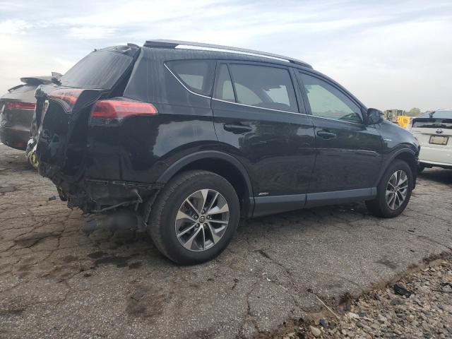 Photo 2 VIN: JTMRJREV8HD069584 - TOYOTA RAV4 HV LE 