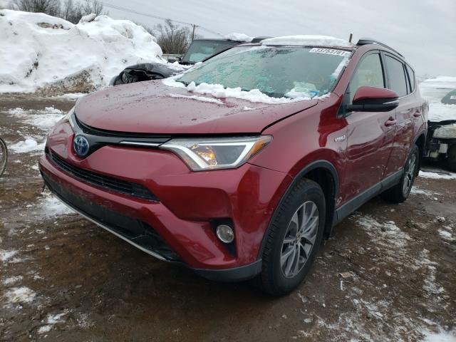 Photo 1 VIN: JTMRJREV8JD161381 - TOYOTA RAV4 HV LE 