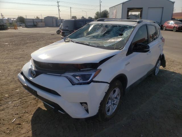 Photo 1 VIN: JTMRJREV8JD188208 - TOYOTA RAV4 HV LE 