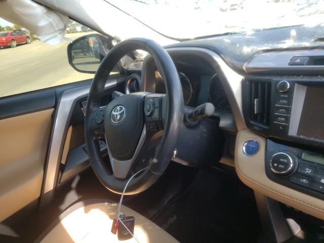 Photo 8 VIN: JTMRJREV8JD188208 - TOYOTA RAV4 HV LE 