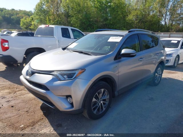 Photo 1 VIN: JTMRJREV8JD194543 - TOYOTA RAV4 HV 