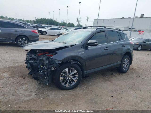 Photo 1 VIN: JTMRJREV8JD214628 - TOYOTA RAV4 HYBRID 