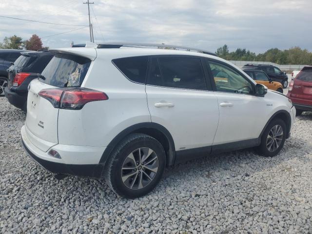 Photo 2 VIN: JTMRJREV8JD257723 - TOYOTA RAV4 HV LE 