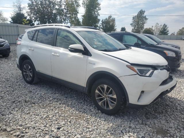 Photo 3 VIN: JTMRJREV8JD257723 - TOYOTA RAV4 HV LE 