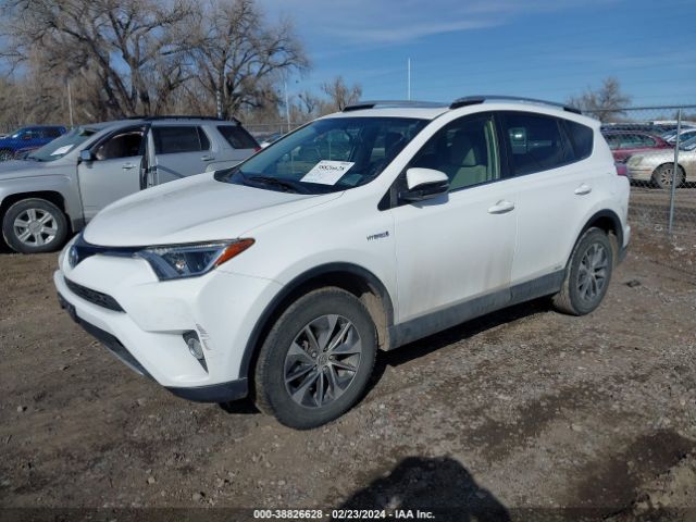 Photo 1 VIN: JTMRJREV9GD012938 - TOYOTA RAV4 HYBRID 