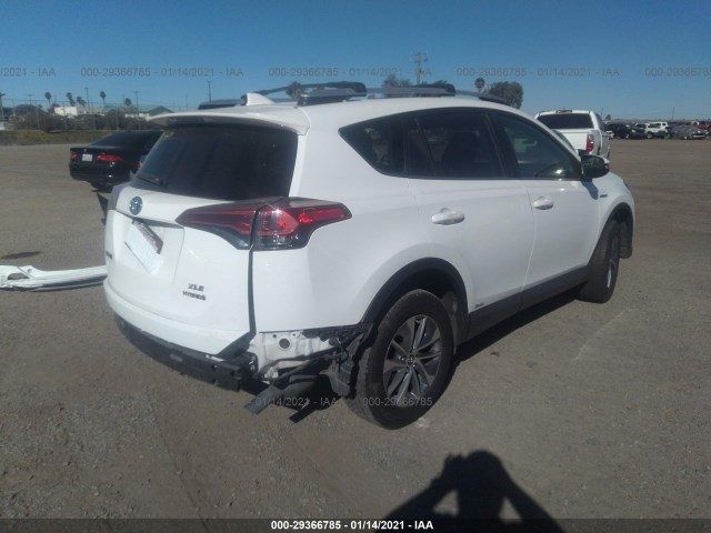 Photo 3 VIN: JTMRJREV9GD048404 - TOYOTA RAV4 HYBRID 