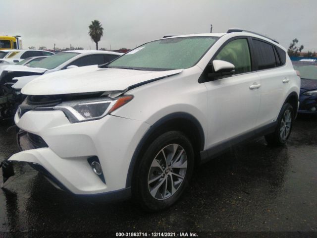 Photo 1 VIN: JTMRJREV9GD048435 - TOYOTA RAV4 HYBRID 