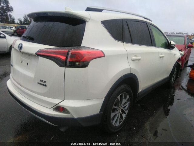 Photo 3 VIN: JTMRJREV9GD048435 - TOYOTA RAV4 HYBRID 