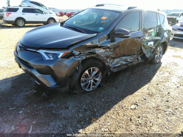 Photo 1 VIN: JTMRJREV9GD058088 - TOYOTA RAV4 HYBRID 