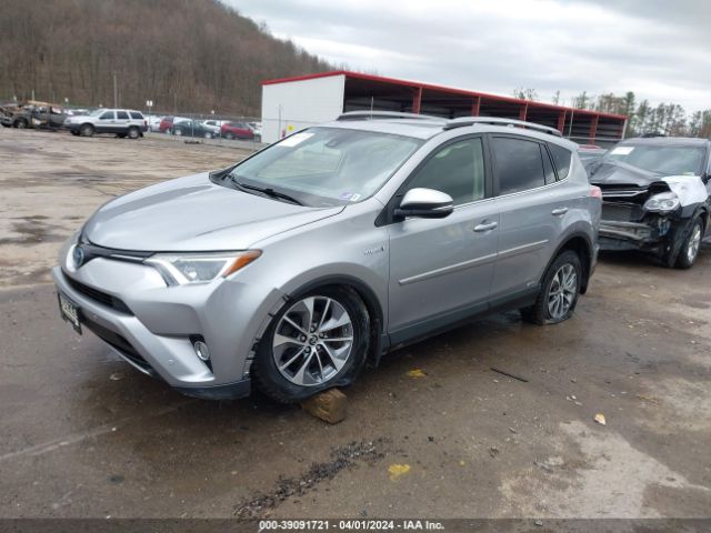 Photo 1 VIN: JTMRJREV9HD099726 - TOYOTA RAV4 HYBRID 