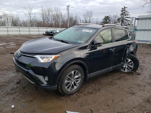 Photo 1 VIN: JTMRJREV9HD141778 - TOYOTA RAV4 HV LE 