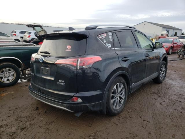 Photo 3 VIN: JTMRJREV9HD141778 - TOYOTA RAV4 HV LE 