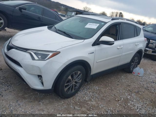 Photo 1 VIN: JTMRJREV9JD154679 - TOYOTA RAV4 HYBRID 