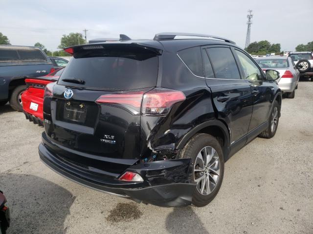 Photo 3 VIN: JTMRJREV9JD180229 - TOYOTA RAV4 HV LE 