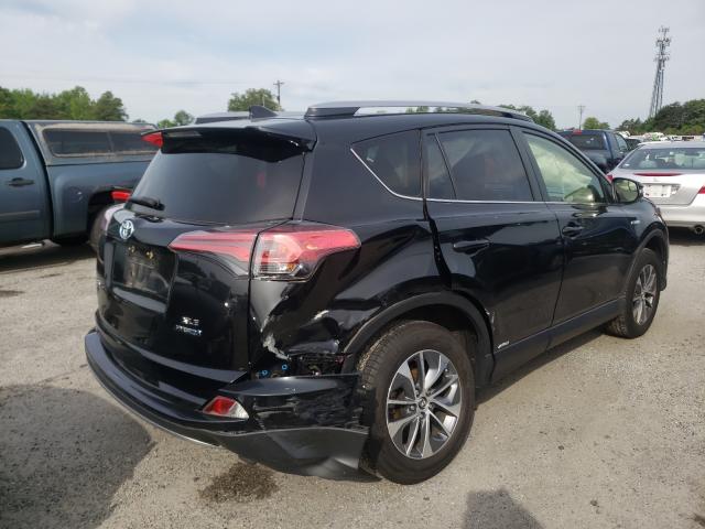 Photo 8 VIN: JTMRJREV9JD180229 - TOYOTA RAV4 HV LE 