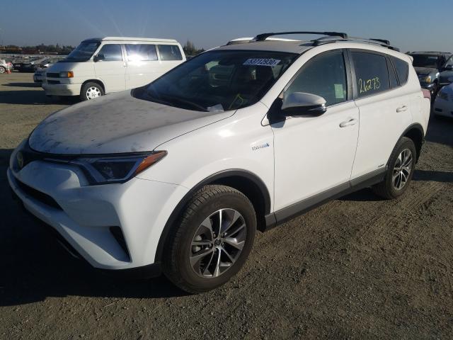 Photo 1 VIN: JTMRJREV9JD196818 - TOYOTA RAV4 HV LE 