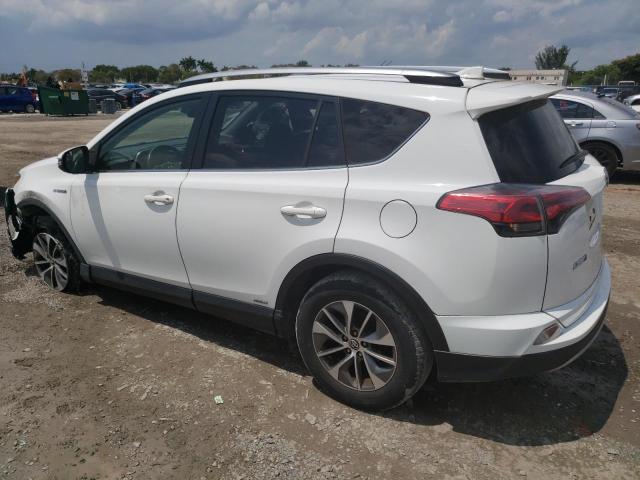 Photo 1 VIN: JTMRJREV9JD204402 - TOYOTA RAV4 HV LE 