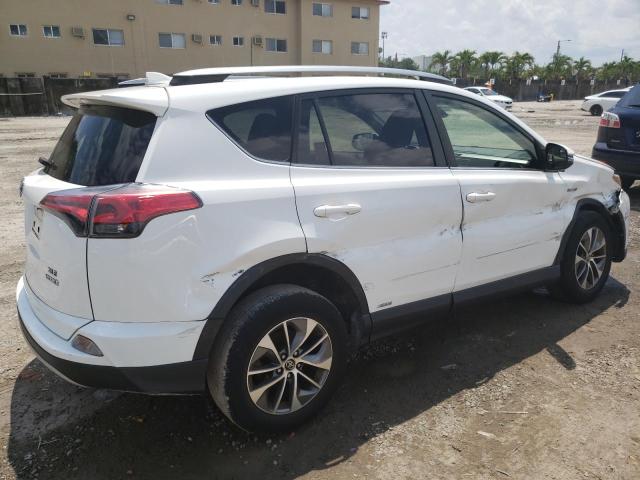 Photo 2 VIN: JTMRJREV9JD204402 - TOYOTA RAV4 HV LE 