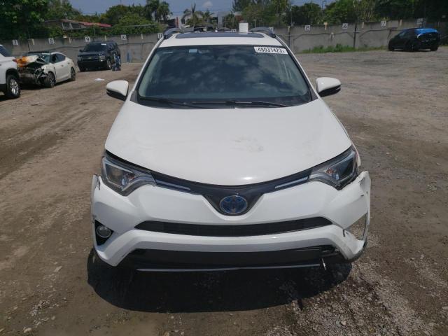 Photo 4 VIN: JTMRJREV9JD204402 - TOYOTA RAV4 HV LE 