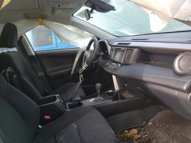 Photo 4 VIN: JTMRJREV9JD215870 - TOYOTA RAV4 HV LE 