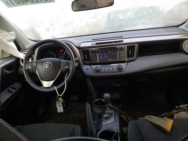 Photo 8 VIN: JTMRJREV9JD215870 - TOYOTA RAV4 HV LE 