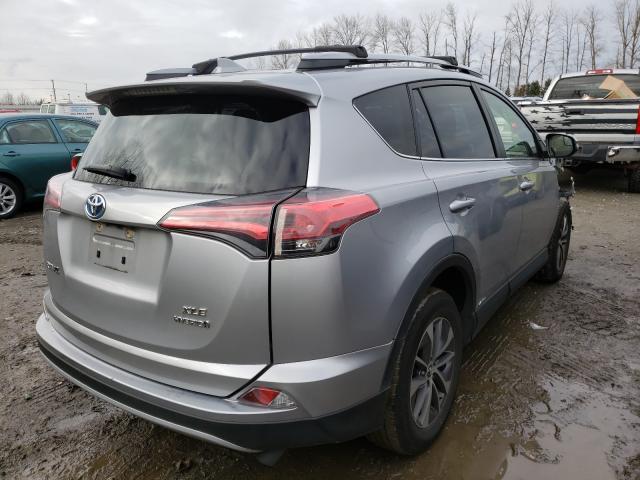 Photo 3 VIN: JTMRJREV9JD228747 - TOYOTA RAV4 HV LE 