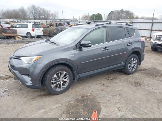 Photo 1 VIN: JTMRJREVXHD064371 - TOYOTA RAV4 HYBRID 