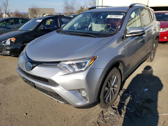 Photo 1 VIN: JTMRJREVXHD070560 - TOYOTA RAV4 HV LE 