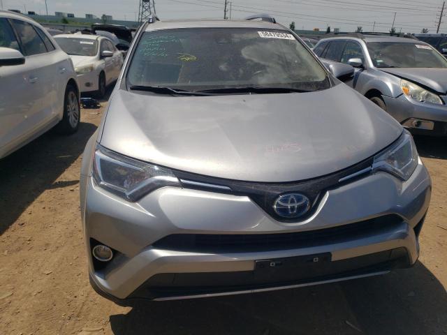 Photo 4 VIN: JTMRJREVXHD097841 - TOYOTA RAV4 HV LE 