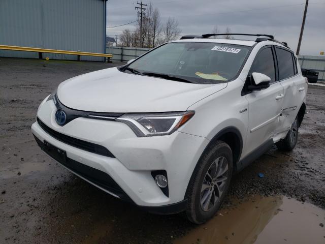 Photo 1 VIN: JTMRJREVXHD118199 - TOYOTA RAV4 HV LE 